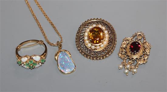 A 14k and gem set pendant, one other 14k pendant, a yellow metal and gem set brooch and a 14k ring.